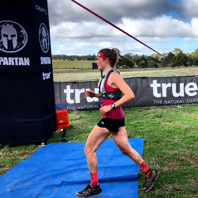 Kate finishing a Spartan race