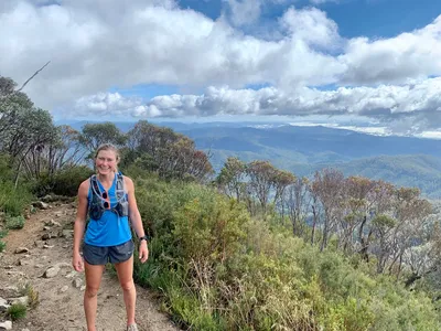 Kate running up a mountain